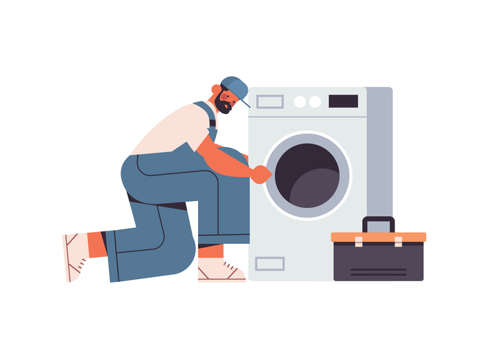 professional plumber technician in uniform repairing washing machine repair service concept